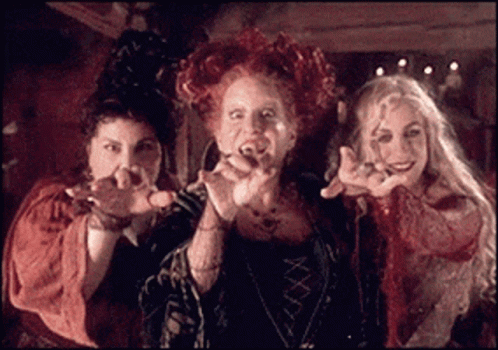 Three Witches Posing With Hands Out GIF