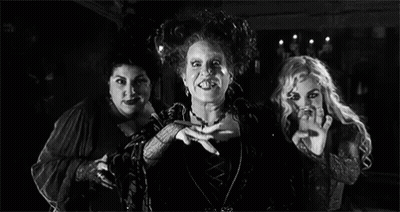 Three Witches Standing Next To Each Other In Room GIF