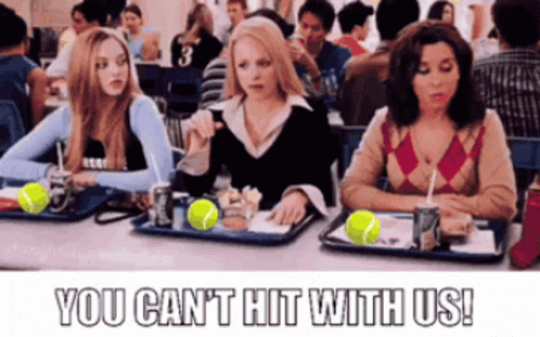 Three Women Are Sitting At A Table With Tennis Balls On Their Trays And The Words You Can 'T Hit With Us . GIF