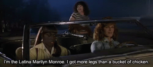 Three Women Are Sitting In A Car And One Of Them Is Saying I 'M The Latina Marilyn Monroe GIF