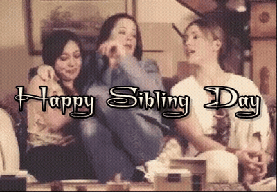 Three Women Are Sitting On A Couch With The Words Happy Sibling Day Below Them GIF