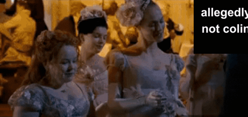 Three Women Are Standing Next To Each Other With The Words Allegedly Not Colin On The Bottom GIF