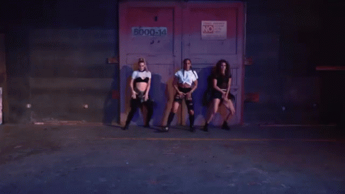 Three Women Dancing In Front Of No Door GIF