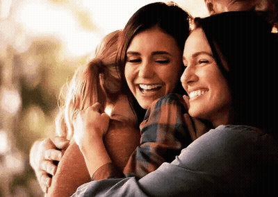 Three Women Hugging And Smiling GIF