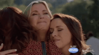 Three Women Hugging Hallmark Sign GIF