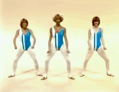 Three Women In Blue And White Swimsuits Are Standing In A Row With Their Hands On Their Hips GIF