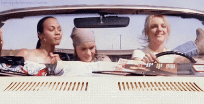 Three Women In Convertible Looking At Map GIF