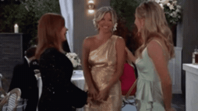 Three Women In Dresses Talking GIF