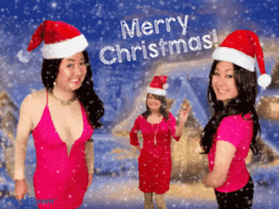 Three Women In Santa Hats Saying Merry Christmas GIF