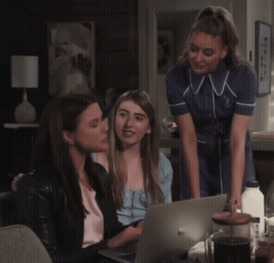 Three Women Looking At Laptop One In Nurse Uniform GIF