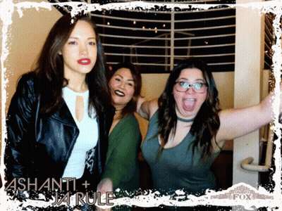 Three Women Pose For A Photo With The Name Ashanti On It GIF