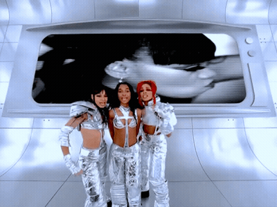 Three Women Posing In Front Of TV Screen GIF