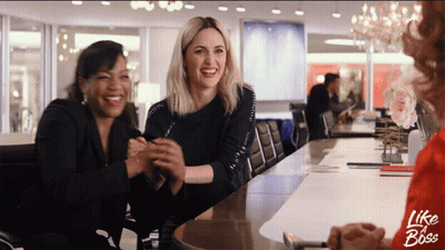 Three Women Sitting At A Table With The Words Like A Boss On The Bottom Right GIF