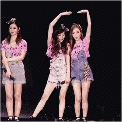 Three Women Stage Arms Up One Holding Mic GIF