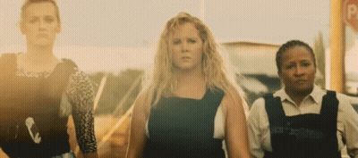 Three Women Standing By Parking Sign GIF