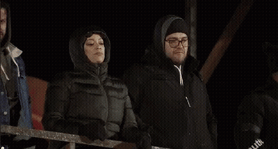 Three Women Standing In Dark Room GIF