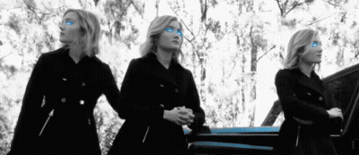 Three Women Standing Next To Car With Blue Eyes GIF