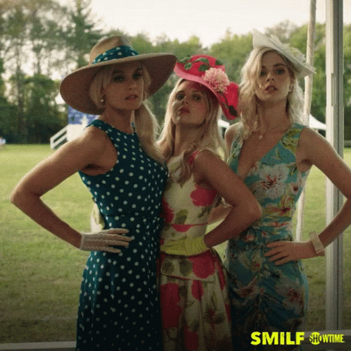 Three Women Standing Next To Each Other With The Words Smilf Showtime At The Bottom GIF
