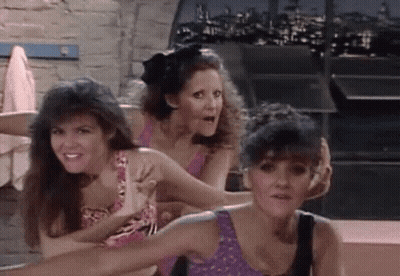 Three Women Standing Together One Holding Hand GIF
