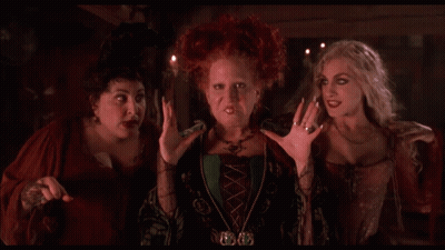 Three Women Standing With Sally Necklace GIF