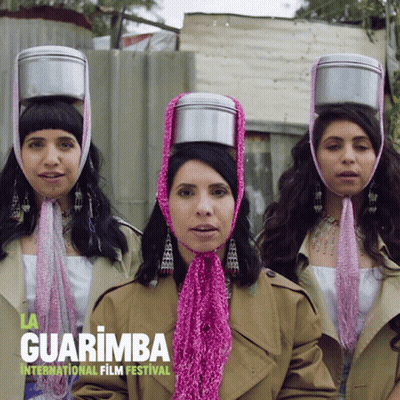 Three Women Wearing Pots On Heads Guarimba International Film Festival GIF
