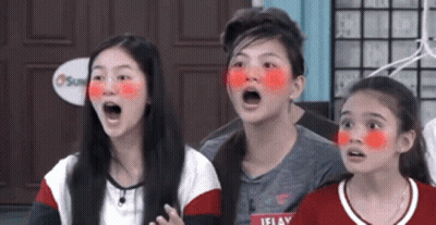 Three Young Girls With Red Painted Faces Open Mouths GIF