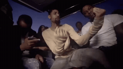 Three Young Men Sitting In Front Of Group Picture GIF