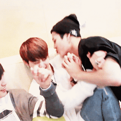Three Young Men Sitting On Couch Pointing GIF
