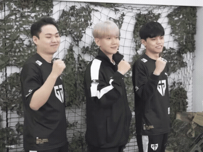 Three Young Men Wearing G7 Jerseys Stand In Front Of A Fence GIF