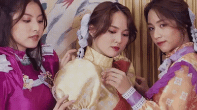 Three Young Women One In Purple Dress GIF