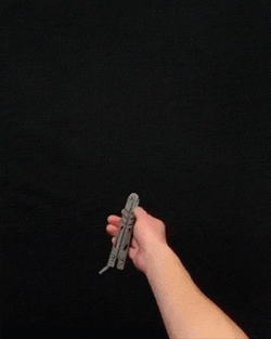 Thrilling Butterfly Knife Stunt GIF