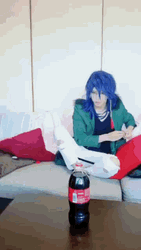 Throwing Mentos To Coke Bottle GIF