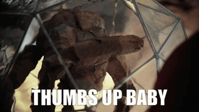 Thumbs Up Baby Statue GIF