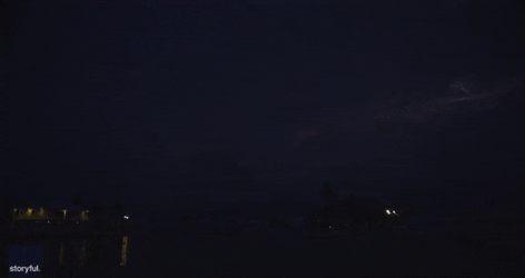 Thunderstorm Lightning Over Night Clouds GIF