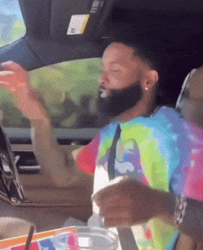 Tie Dye Shirt Man In Car With Arms Outstretched GIF