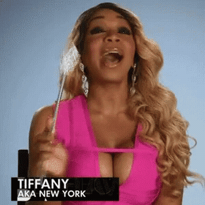 Tiffany Aka New York Holding Wand In Pink Top GIF