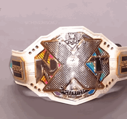 Tiffany Stratton Flexing Her Belt GIF