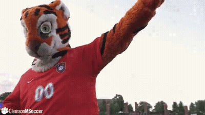 Tiger Mascot In Red Shirt Number 00 GIF