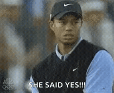 Tiger Woods In Hat And Vest Saying She Said Yes GIF