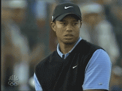 Tiger Woods Wearing Nike Hat And Blue Shirt GIF