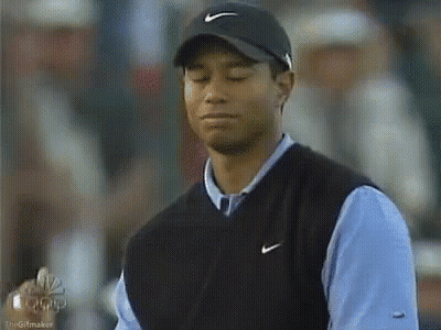 Tiger Woods Wearing Nike Hat And Vest GIF