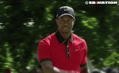 Tiger Woods Wearing Red Shirt And Black Hat GIF