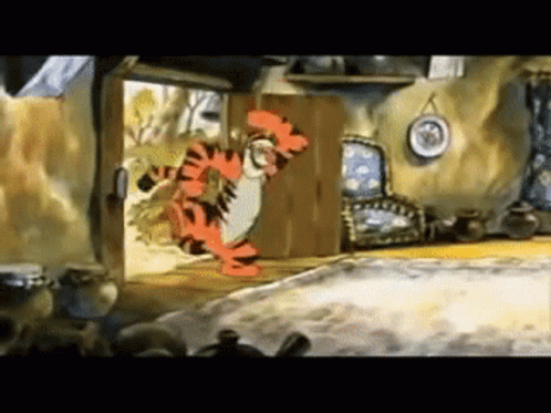 Tigger From Winnie The Pooh Is Standing In The Doorway Of A Room . GIF