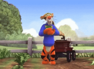 Tigger Standing Next To Wagon GIF