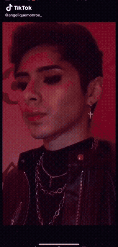 TikTok Video Of Woman Face With Blue Background GIF