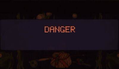Tilt Sign Lit Up In Dark Room GIF