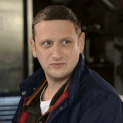 Tim Robinson Squinting His Eyes GIF