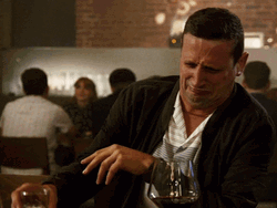 Tim Robinson Wafting Smell Disgusted Face GIF