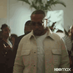Timbaland Talking To Someone While Walking GIF
