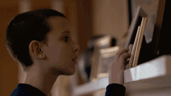 Timid Eleven Checking Out Pretty Pictures GIF